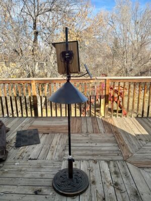 smart birdfeeder mounted free-standing on pole on deck or patio